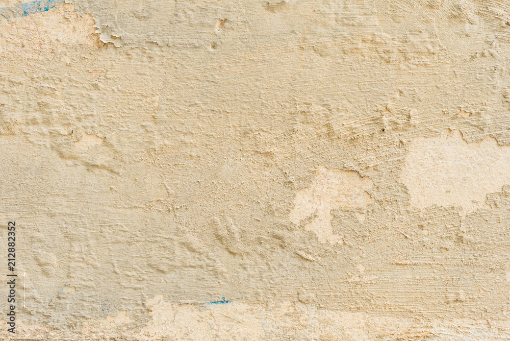 Wall fragment with scratches and cracks