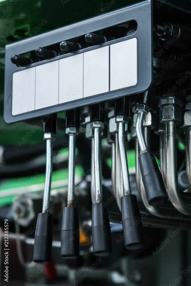 levers of management of construction equipment on the tractor, the excavator, the grader, etc. levers of management of construction equipment on the tractor, the excavator, the grader, etc.