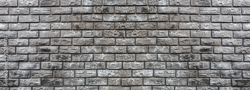 brick wall of decorative gray stone. background