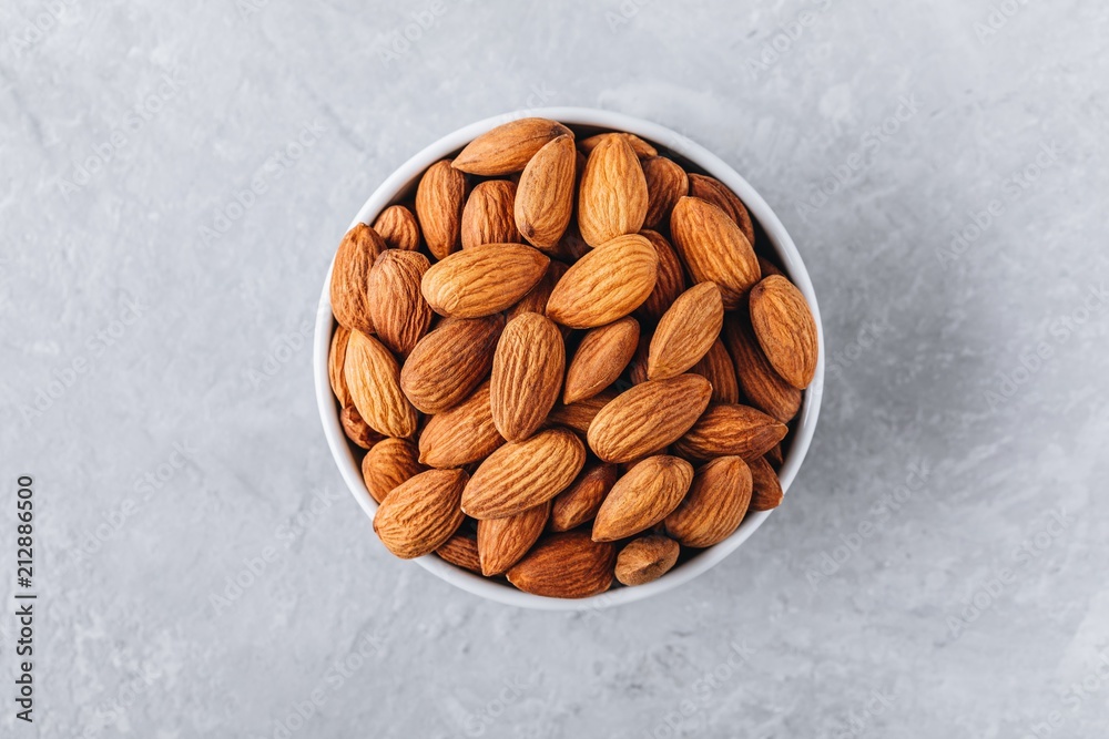 raw whole almond in bowl