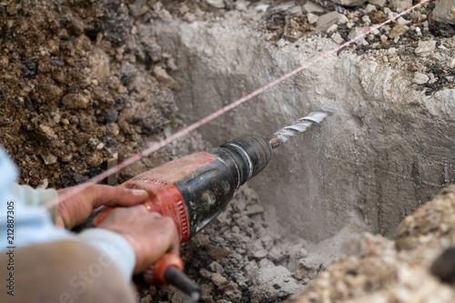 bricklayer at work in a building site