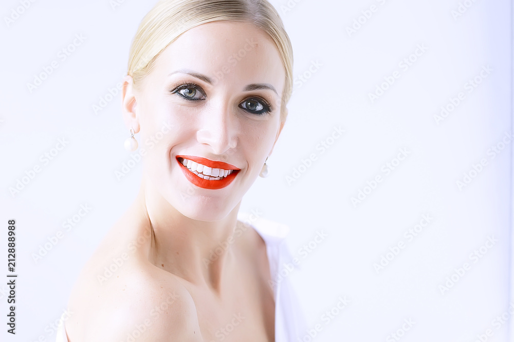 model with professional make-up and bright red lips / beautiful make-up on the face of the model, saturated with bright red lipstick on the lips model with professional make-up and bright red lips / beautiful make-up on the face of the model, saturated with bright red lipstick on the lips