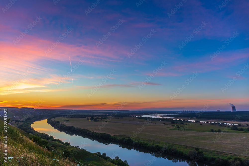 Beautiful nature landscape panorama sunset with dramatic sky and river in valley