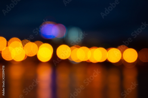 Lights of night at city. Blurred bokeh, abstract background texture © Tatiana Lukina