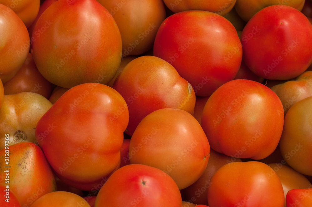 A group of red tomatoes, close-up A group of red tomatoes, close-up