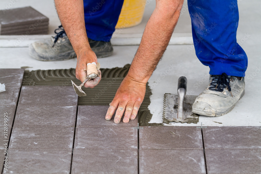 bricklayer at work in building site
