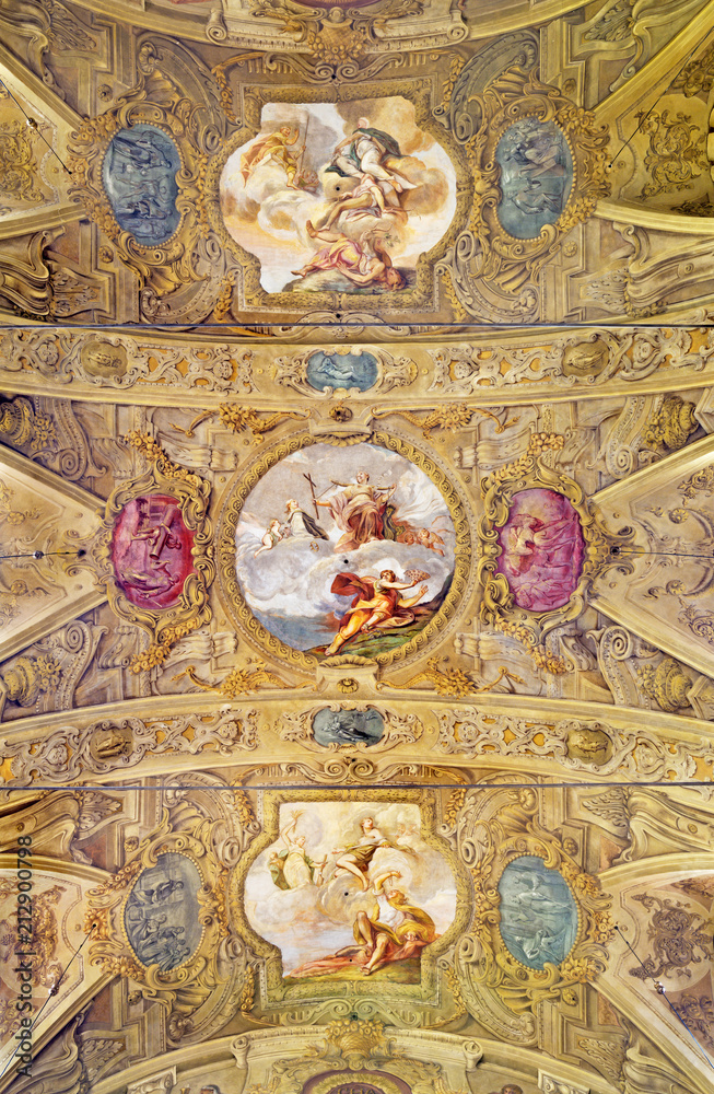 MODENA, ITALY - APRIL 14, 2018: The baroque ceiling fresco with scenes fom live of St. Barbara in church Chiesa di San Barnaba by Sigismondo Caula and Antonio Mannini from begin of 18. cent.