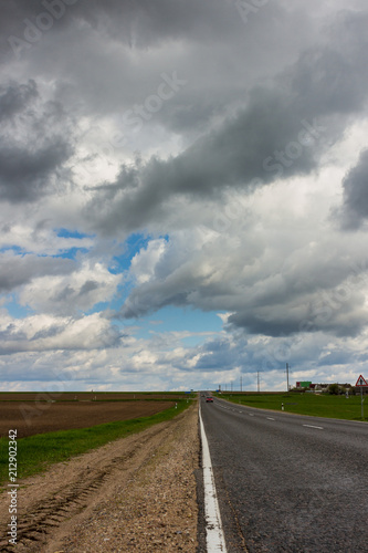 Road and dramatic stormy sky