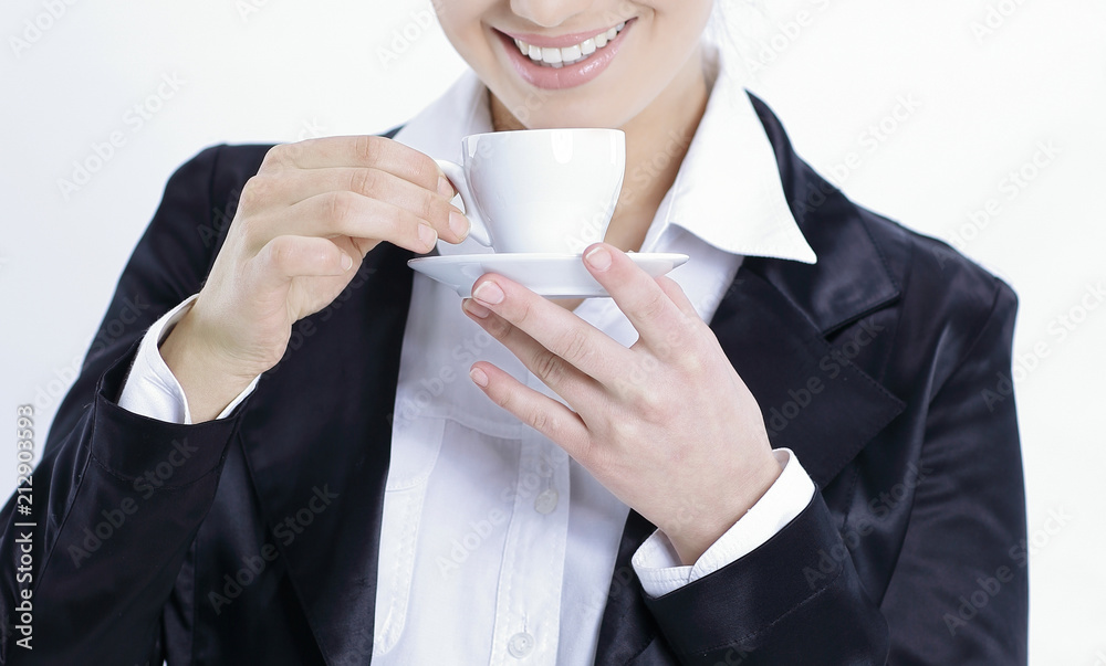 closeup. confident business woman with a Cup of coffee closeup. confident business woman with a Cup of coffee