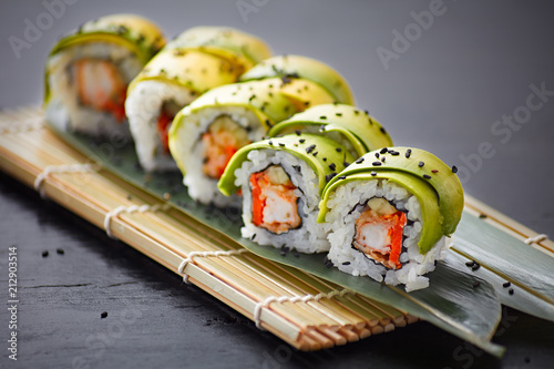 delicious pieces of california sushi with avocado
