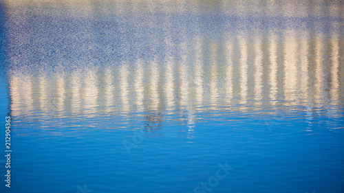 Reflection of a building on the surface of water