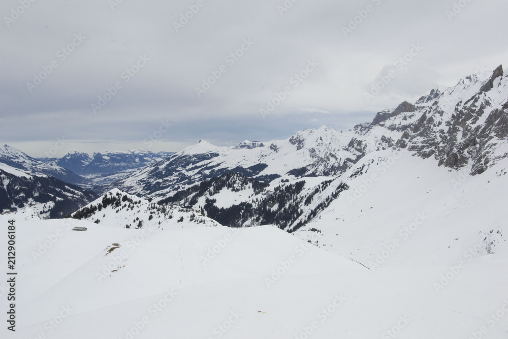 some time spent in switzerland alps while skiing, mostly cloudy weather, but beautiful landscape view of mountain peaks
