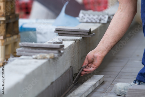 bricklayer at work in building site