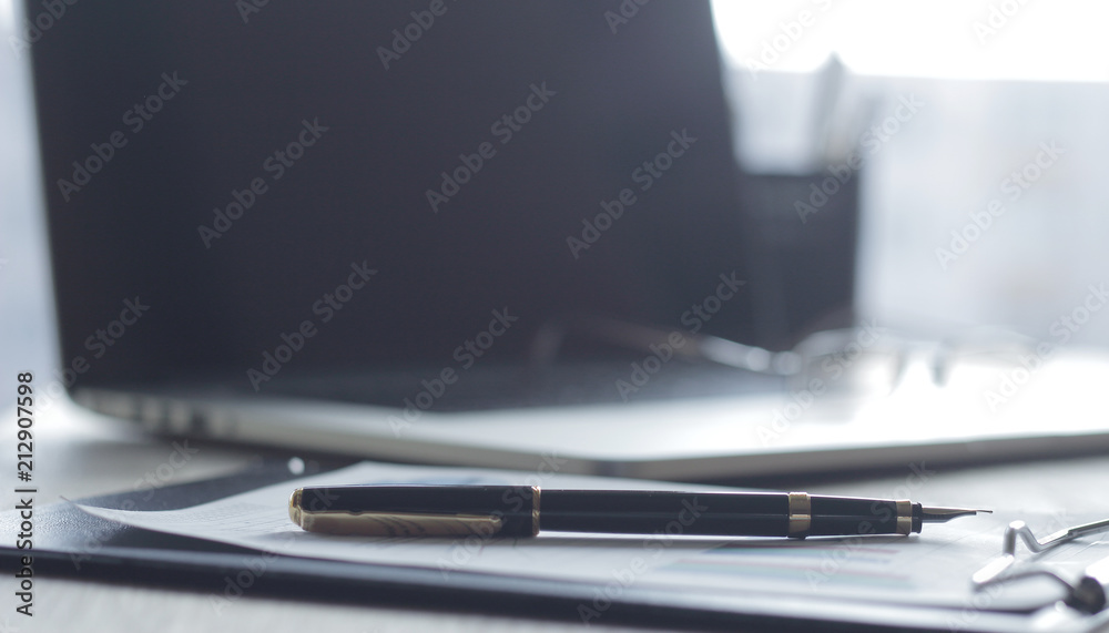 close up.fountain pen on blurred office background.photo with copy space close up.fountain pen on blurred office background.photo with copy space