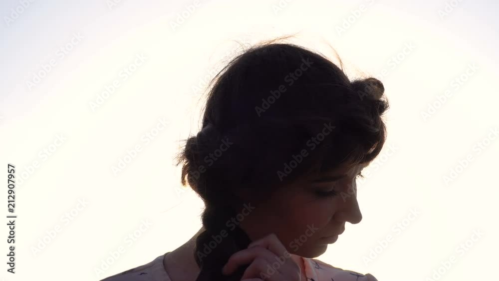 Portrait of Adorable Caucasian Brunette girl in Light Pink Dress at Sunrise Time