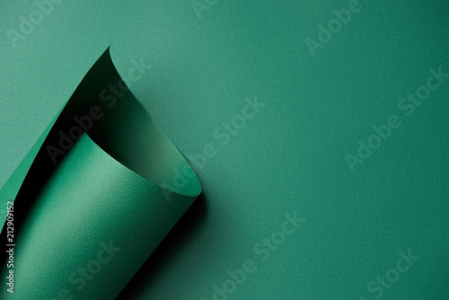 close-up view of beautiful bright abstract green paper background