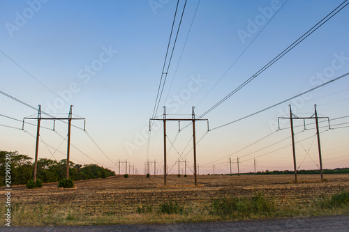 power lines on sunset background