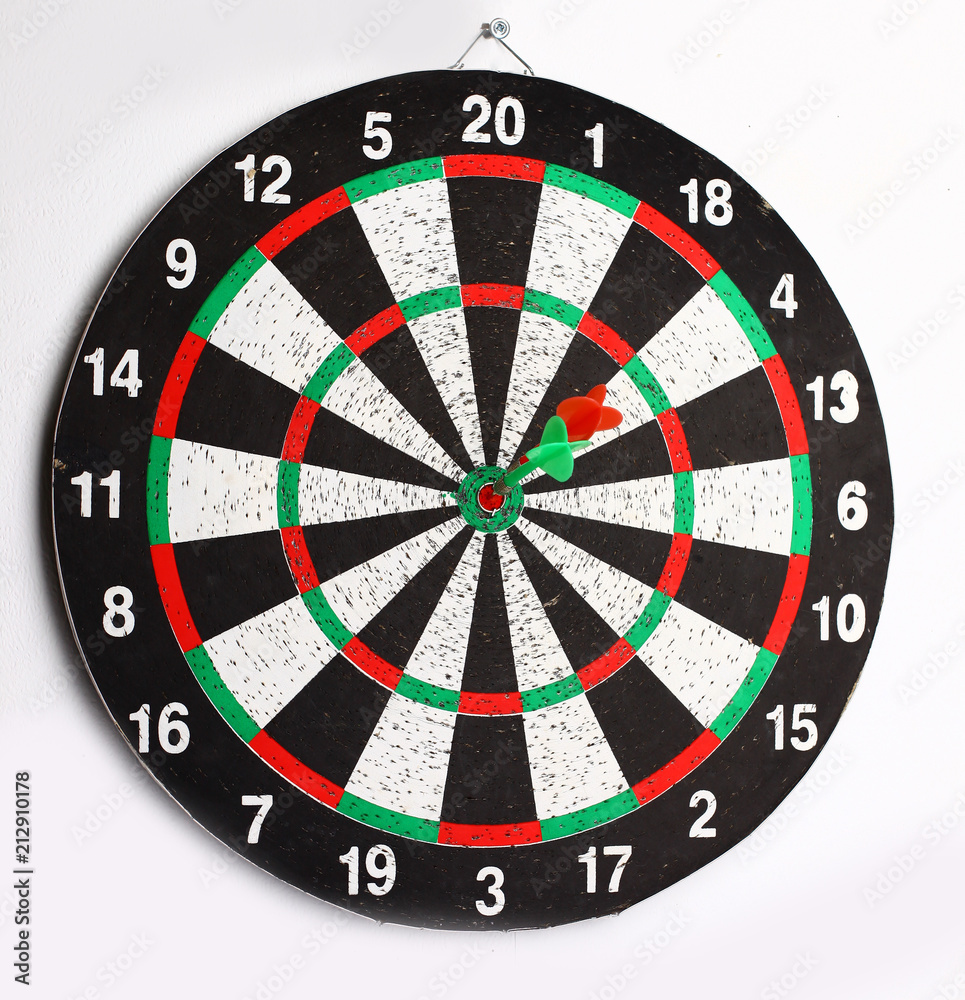 side view.Arrow dart hitting the center of the target dart Board side view.Arrow dart hitting the center of the target dart Board