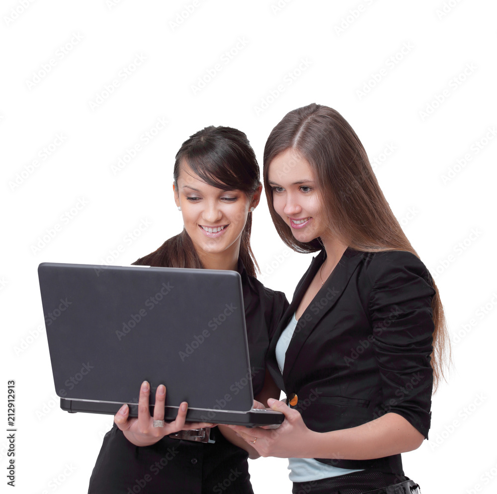 two successful employees looking at laptop screen two successful employees looking at laptop screen