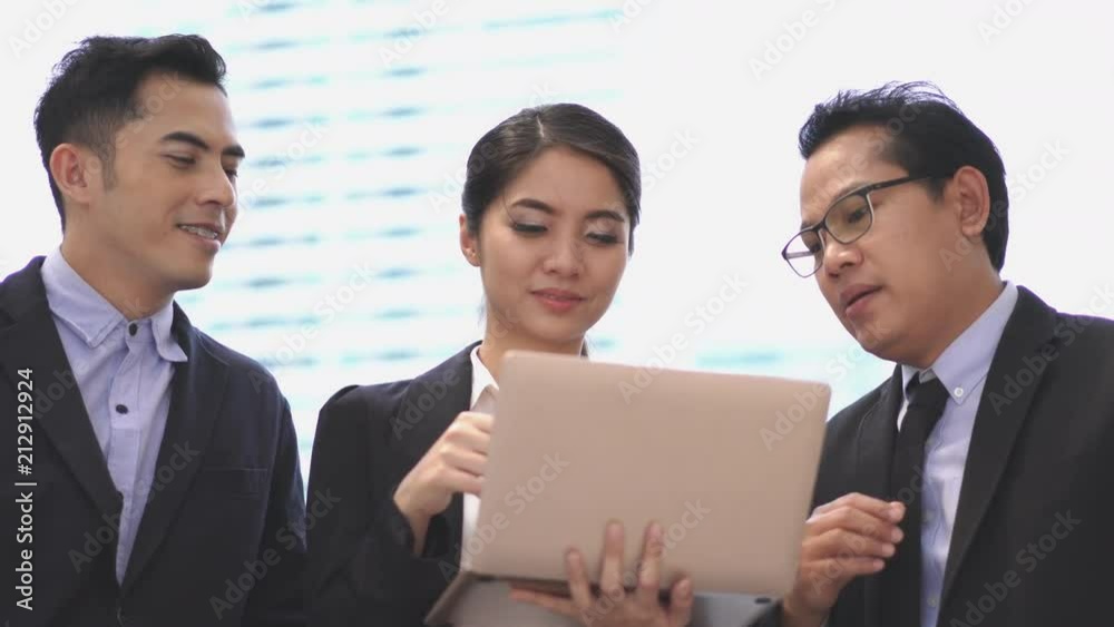 Businessman and Businesswoman talking discuss project together. Concept of project management, business meeting, strategy and performance. Businessman and Businesswoman talking discuss project together. Concept of project management, business meeting, strategy and performance.