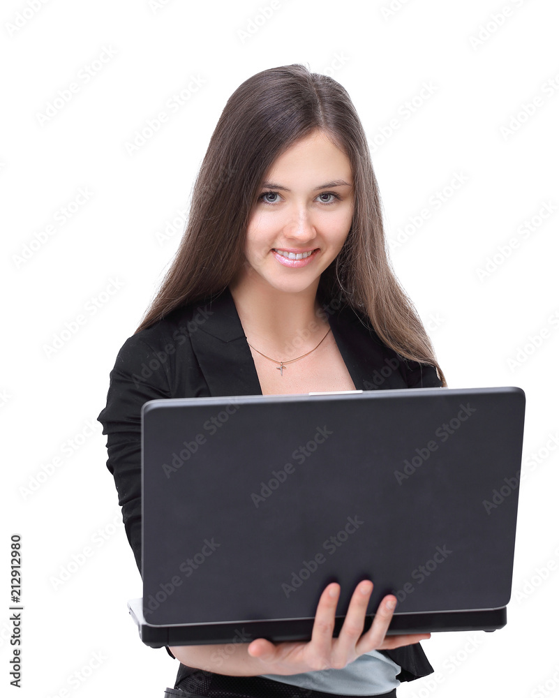 successful business woman is standing with an open laptop successful business woman is standing with an open laptop