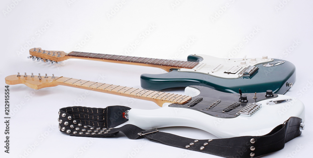 closeup.two stylish electric guitar . isolated on white.