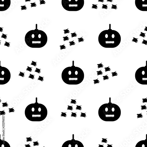 Seamless pattern with black pumpkins and triangles on the white background.