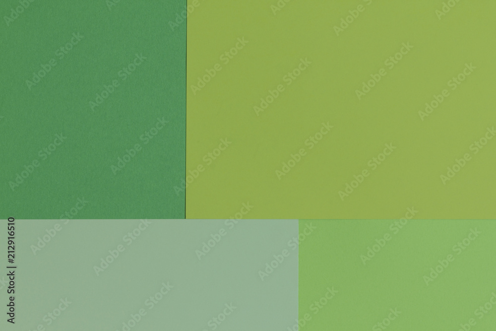 Creative geometric paper background. Pattern of similar (monochrome) shades of green. Flat lay. Creative geometric paper background. Pattern of similar (monochrome) shades of green. Flat lay.