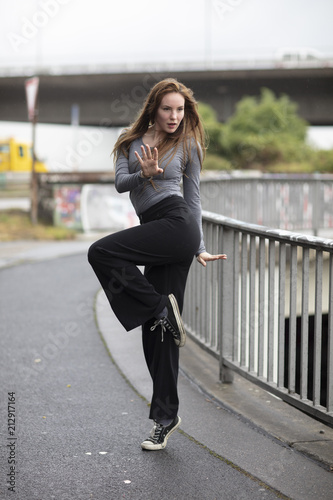 Street Dancer in Motion: One Leg Stand