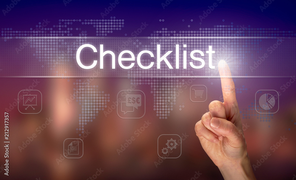 A hand selecting a Checklist business concept on a clear screen with a colorful blurred background. A hand selecting a Checklist business concept on a clear screen with a colorful blurred background.