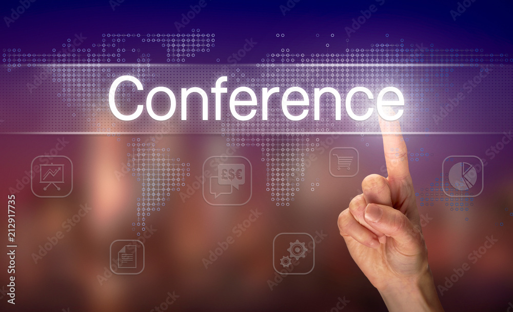 A hand selecting a Conference business concept on a clear screen with a colorful blurred background. A hand selecting a Conference business concept on a clear screen with a colorful blurred background.