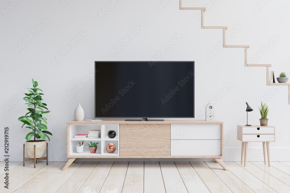 TV on the cabinet in modern living room with plants in living room with empty white wall. 3D rendering.