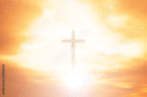 Easter concept:Silhouette cross on Calvary mountain sunset background.  © paul