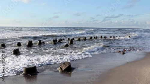 Wavebreakers on Baltic Sea coast  photo