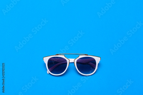 Women fashion glasses close up on bright colored background