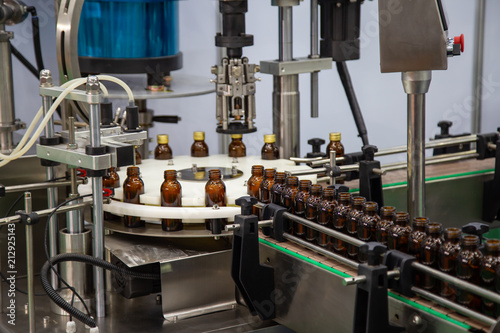 Liquid bottle filling and capping machine