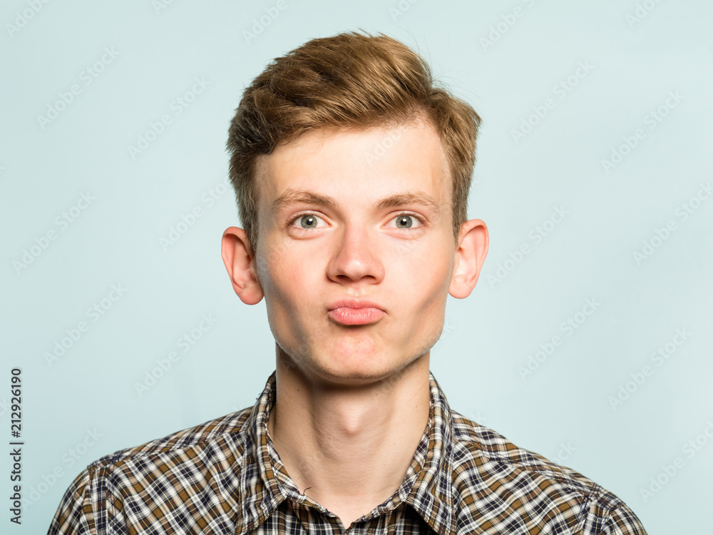 cute smiling man poting. joyful playful behavior. portrait of a young ...