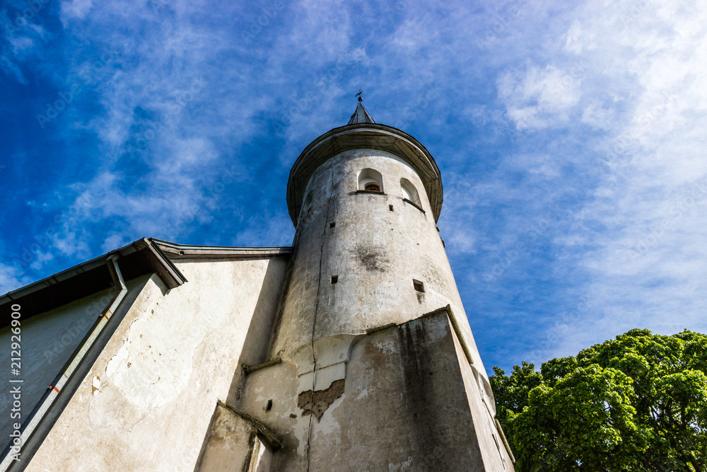 View to ancient church of John the Baptist in Luganuse, Estonia. The church is built in 14th century. View to ancient church of John the Baptist in Luganuse, Estonia. The church is built in 14th century.
