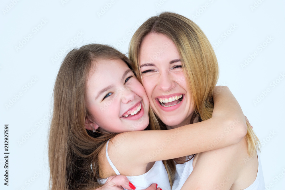 happy family moments. mother and daughter smiling and laughing together hugging. love fun and happiness happy family moments. mother and daughter smiling and laughing together hugging. love fun and happiness