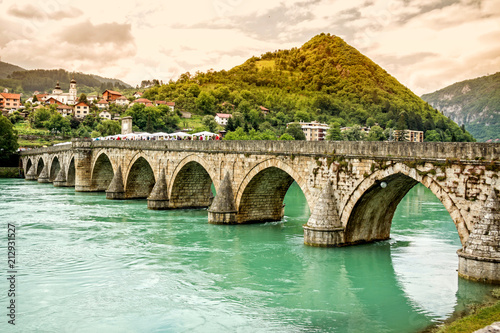 The Ottoman Mehmed Pasa Sokolovic Bridge in Visegrad, Bosnia Herzegovina photo