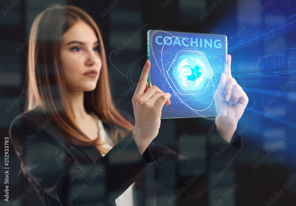 The concept of business, technology, the Internet and the network. A young entrepreneur working on a virtual screen of the future and sees the inscription: coaching The concept of business, technology, the Internet and the network. A young entrepreneur working on a virtual screen of the future and sees the inscription: coaching