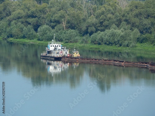 View of the river Don. Photo of a beautiful nature in the summer. Dredging vessel on the Don river