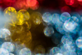 Abstract blue and golden bokeh background, glowing blurred circles