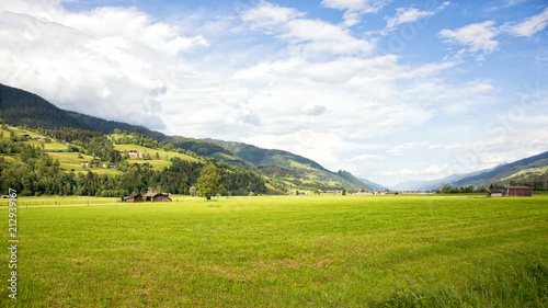 Beautiful lush green Austrian alp valley meadows landscape and hiking trails in the Zell am See area.