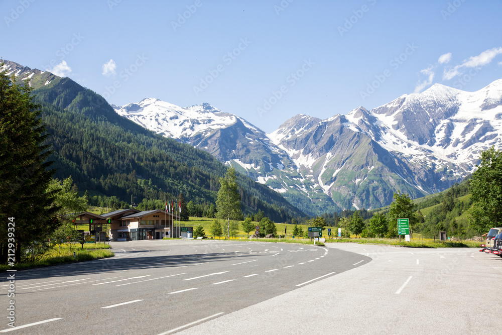 Entrance to the wildpark at the Grossglockner High Alpine Road in Ferleiten, Austria. Shot against a blue sky.