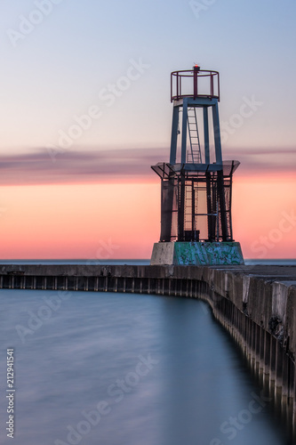 Harbor Light and Pier at Sunset