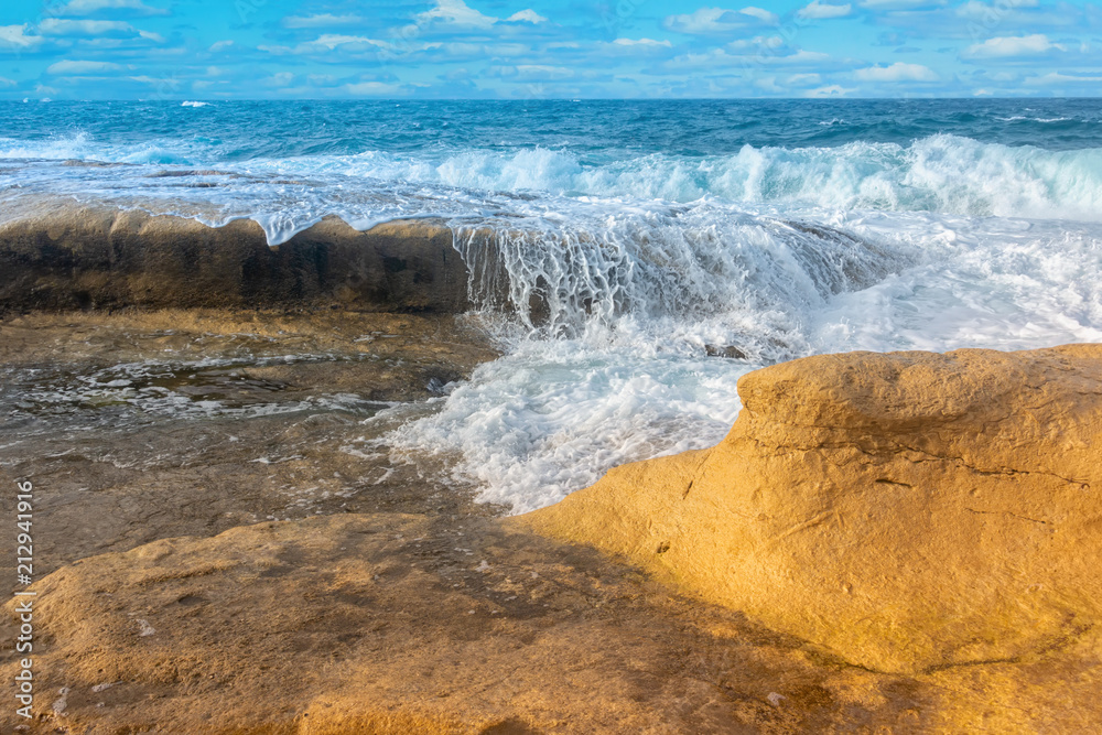 beautiful rock stones coastline during storm of Sliema, Malta