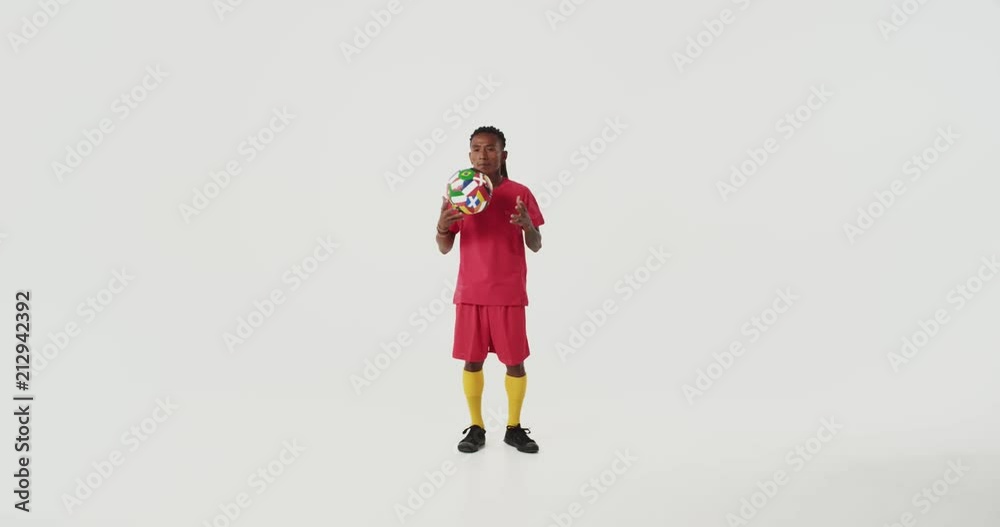 Black guy from Costa Rico plays with a soccer ball Black guy from Costa Rico plays with a soccer ball