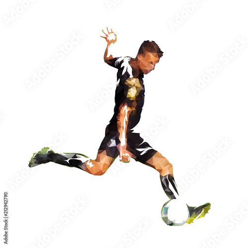 Football player kicking ball, abstract polygonal vector drawing. Soccer athlete. Isolated silhouette, side view © michalsanca