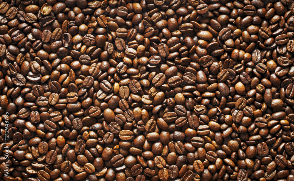 top view of coffee beans as textured background top view of coffee beans as textured background